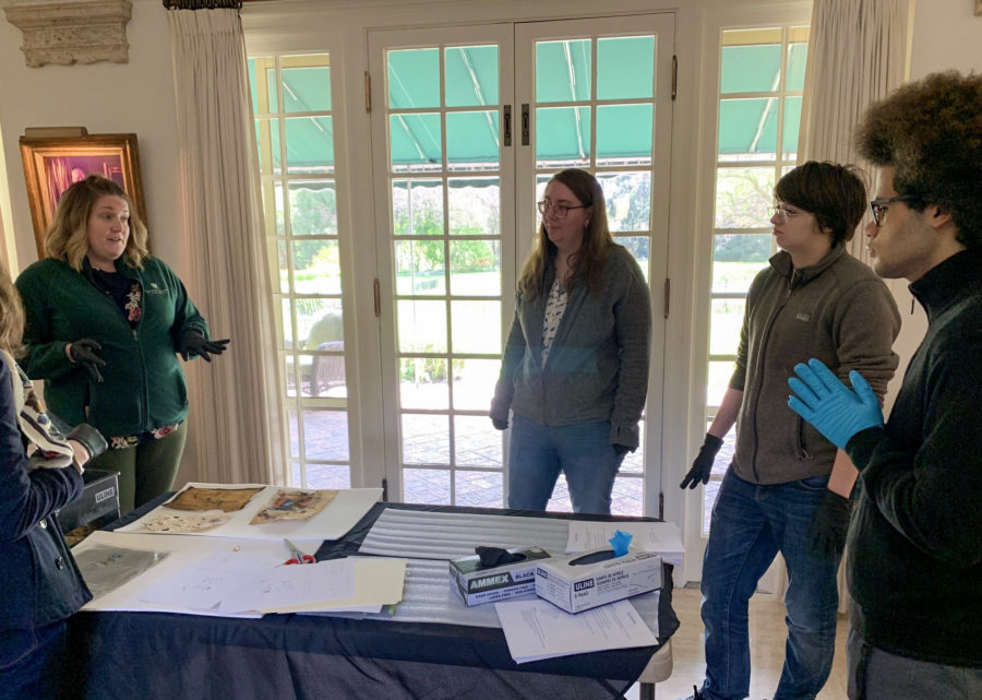 Ruth Mott Foundation staff discuss preservation in the gallery at Applewood