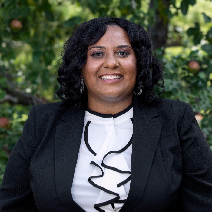 Headshot of Tryphena Clarke