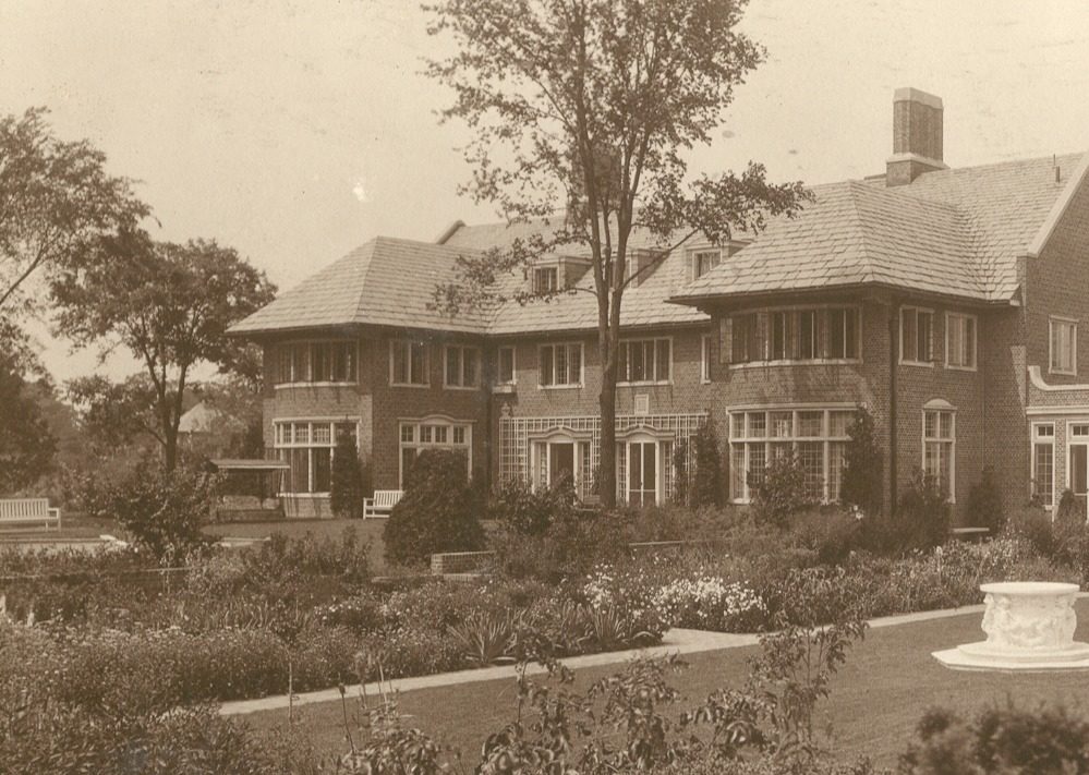 Historic photo of the back of the main house