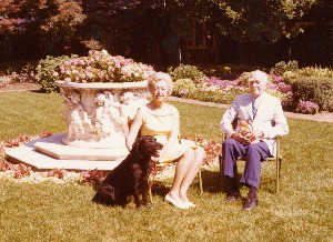 C.S. and Ruth Mott sit for a photo near the marble wellhead at Applewood