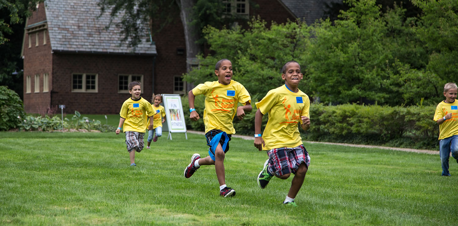 Kids running behind the Applewood Estate.