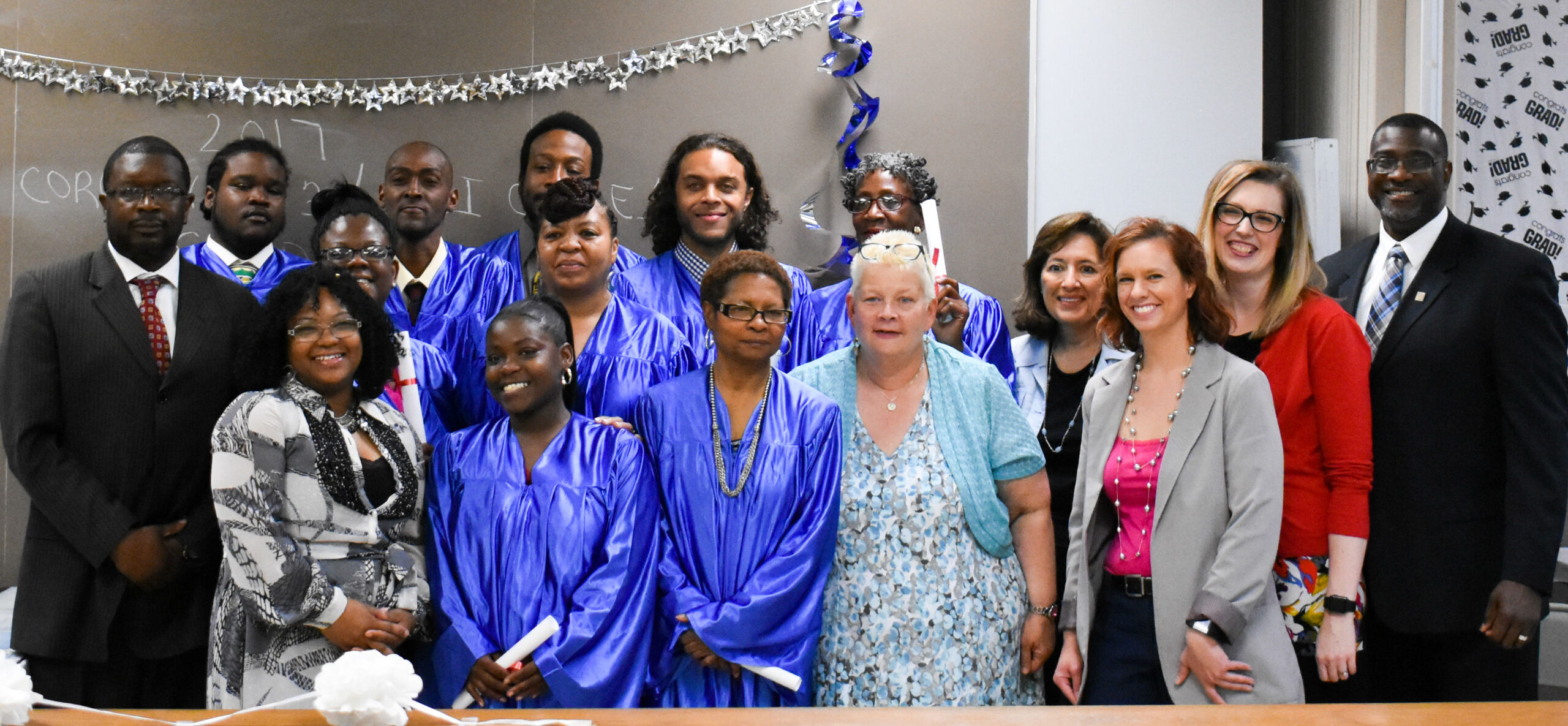 North Flint graduates with supporters.