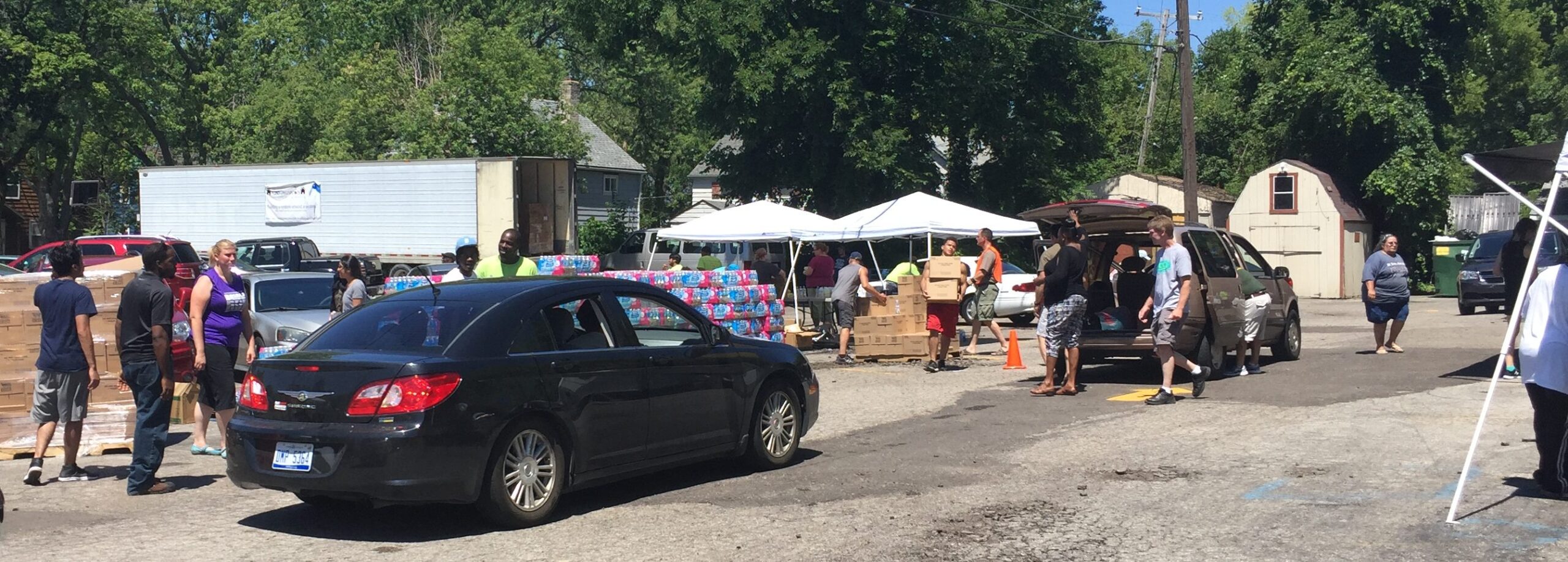 People helping with project in north Flint to provide safe water resources.