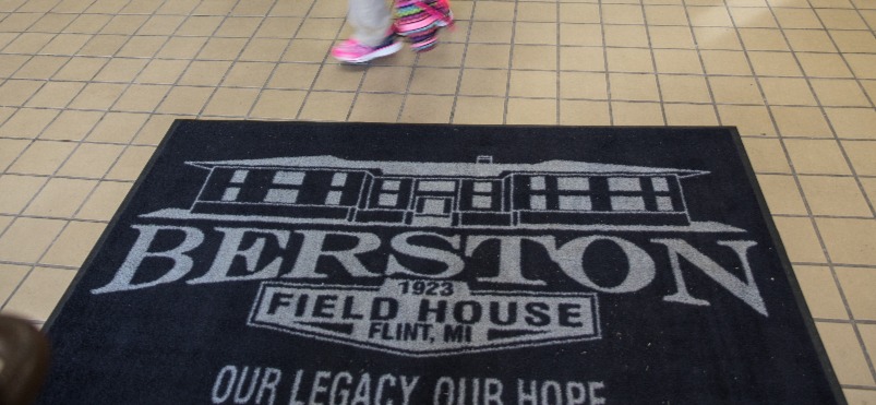 A rug welcomes visitors at Berston Field House