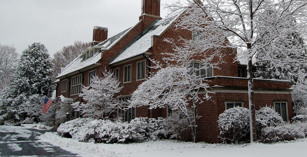 The house at Applewood covered with snow.