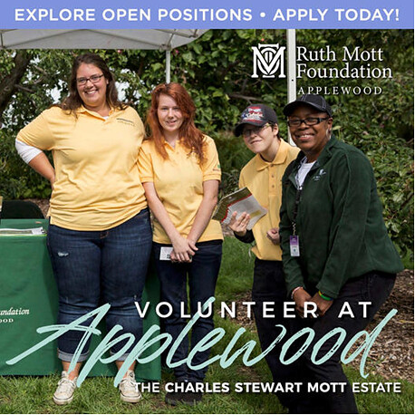 Four people wearing Applewood shirts smile at the camera. Text overlay says Volunteer at Applewood, the Charles Stewart Mott Estate.